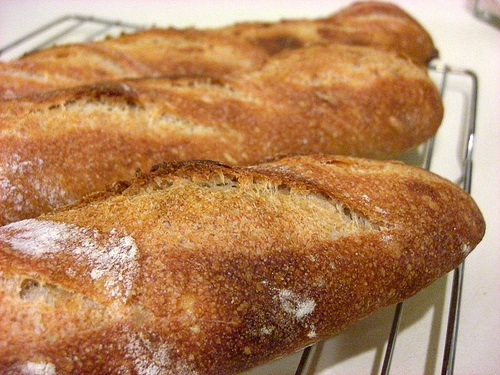 Yeast breads require gluten to trap the carbon dioxide emitted by the yeast as it ferments sugar.