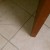 Crack in bathroom floor. Place where door stuck. Crack in bathroom floor. Place where door stuck.