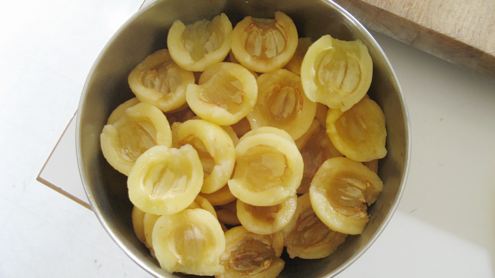 The whitish-yellow flesh of loquats turns pink when baked with loganberries.
