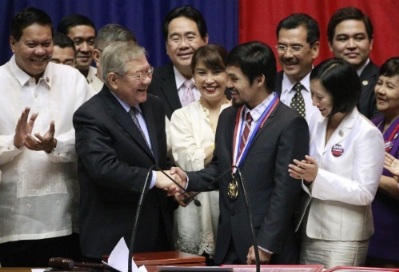 Manny Pacquiao receives the Congressional Medal of Achievement Image Source: http://2.bp.blogspot.com