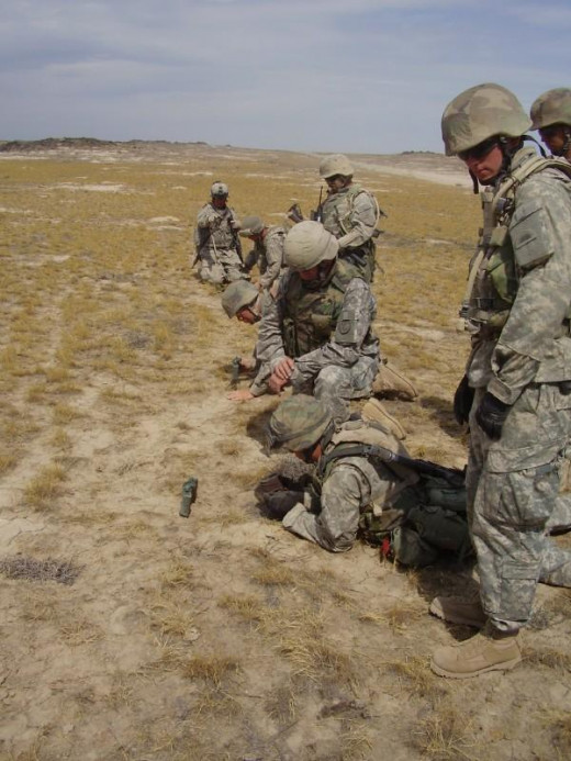Setting up Claymore mines. I'm not the dude on the right, but I'm behind the dude on the right.