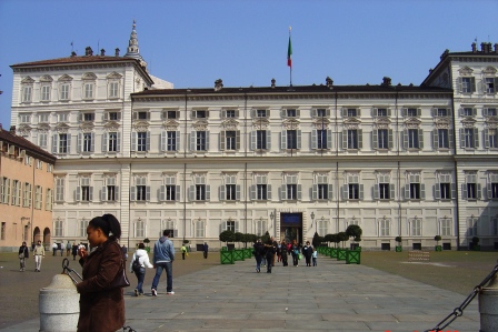 The front of Palazzo Reale, a royal home until the late 19th century. The interior is even more captivating. (In the background is my other half Debbie)