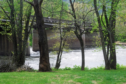 All hikers pass the French Broad River as they leave town.