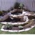 This corner was transformed into a small waterfall pond. This corner was transformed into a small waterfall pond.