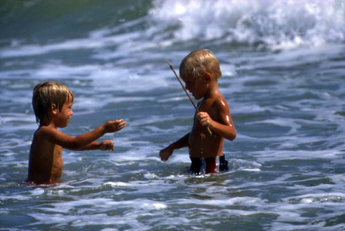 View of boys in the surf at Sebastian Inlet State Park: Melbourne Beach, Florida