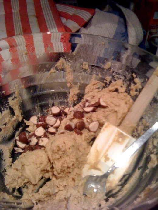 Stir candy bits into the dough as if they were chocolate chips.