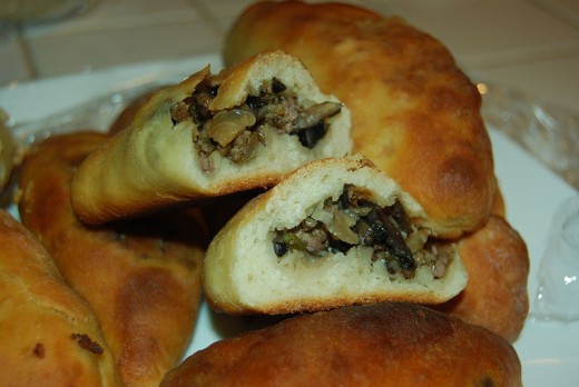 Pirozhkis are filled savory or sweet pastries, and can be made with a yeast bread or pie crust-like dough.
