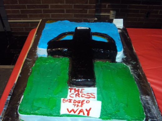 Cake I made for bake off at church the cross is rice crispy candy covered in fondant with brown icing paint