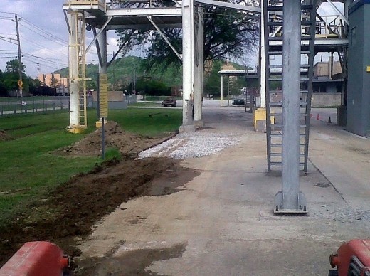 I spent Good Friday at work all by myself.  So I spent that 11 hour shift playing in the dirt and spreading some gravel.