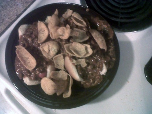 I was in charge of cooking tonight, so I made an extremely unhealthy batch of chili cheese dogs garnished with Fritos.