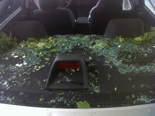 My rental cars rear window didn't stand a chance against last night's hail.  The body didn't hold up too well either.