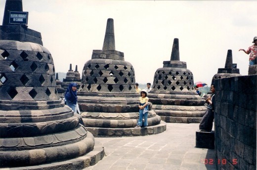Stupas at Borobudur temple, a beautiful temple which was built by Mataram King  with strong influence of Budhism. This character makes the temple different from Hindu temples like Perambanan  above.