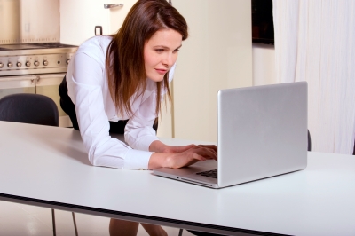 Woman working online at home