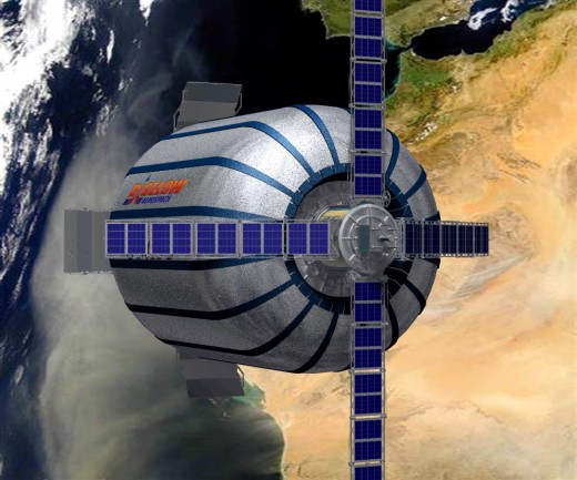 An artist's conception shows the Genesis series of pathfinder modules being launched by Bigelow Aerospace.