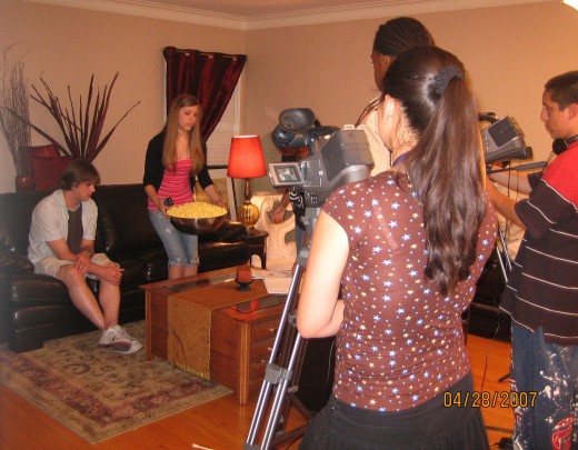 Actors filming a scene for a Time Warner Cable Show.
