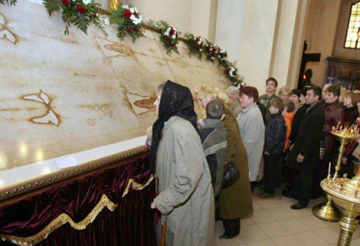 The Turin Shroud - an orderly queue in Lviv, Ukraine, lining up to kiss it on Easter Day. (I don't know what it was doing there... I thought it belonged in Turin)