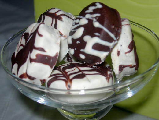 assorted homemade polvorons dipped, coated and drizzled in white and dark chocolate
