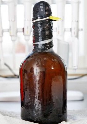 Scientists at the Technical Research Centre of Finland are decipering the ancient recipe of the worlds oldest beer, found on a shipwreck at the bottom of the Baltic Sea. One goal is to find live yeast spores. This is one of 5 bottles found.