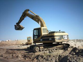 Heavy equipment preparing land for new construction in Rocky Point, Mexico.