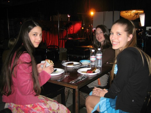 Child actors on a lunch break on the set of a commercial.