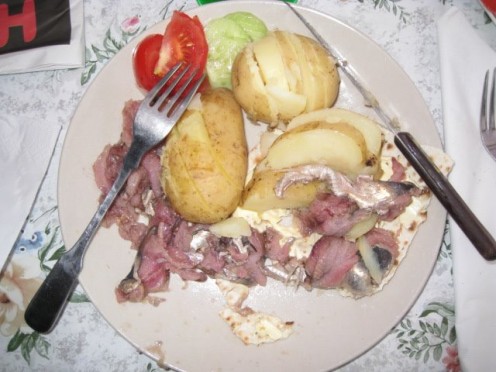 Traditional surstrmming with potatoes and tunnbrd