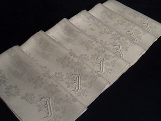 Monogrammed antique linen napkins laundered at home and ready to use.