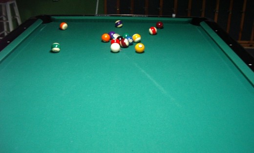 Photo 2:  A bad break where 4 balls did not hit the cushions, and the cue ball is in a bad position for the next player