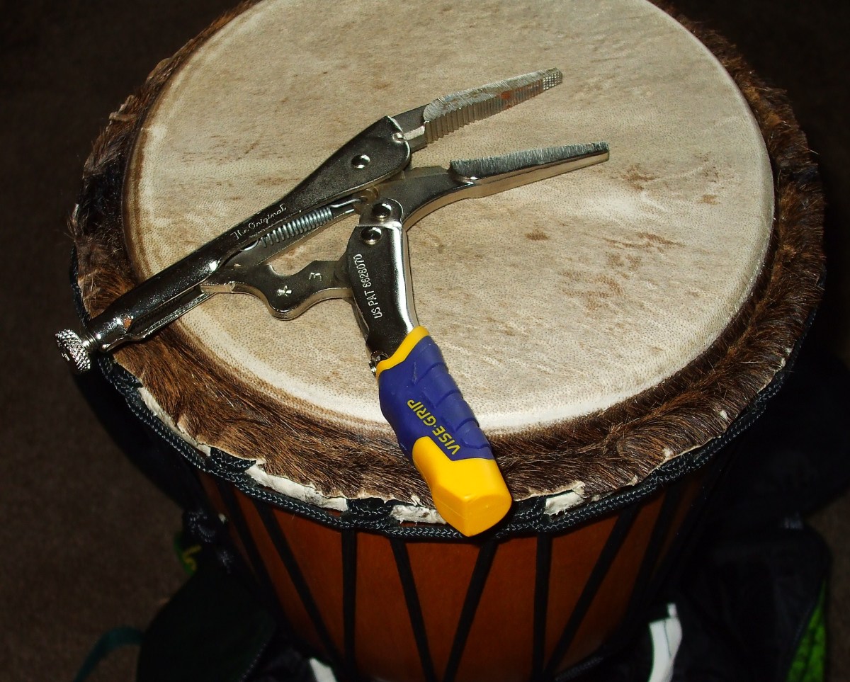 Djembe hand-made by Doug Libby in the authentic west African way and the secret tool for tuning.