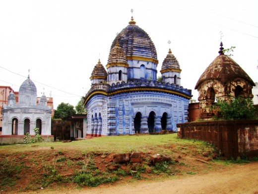 The Radha Madhav temple complex with Rasmancha on the left, the main temple in the centre & the laterite structure on the right
