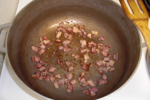First step of cooking this dish is to render the fat from the country style bacon in a large pot.  I like to cook the bacon until just a bit brown as it will finish cooking in the blackeyed peas.