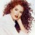 Long, curly hair is romantic and sexy...and hard to take care of. Image:Curly Hair Styles Magazine Long, curly hair is romantic and sexy...and hard to take care of. Image:Curly Hair Styles Magazine