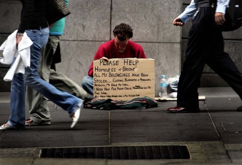 This picture is entitled "Bum". This is how we tend to look at those with no place to live.