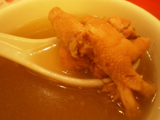 Chicken feet and peanut soup.