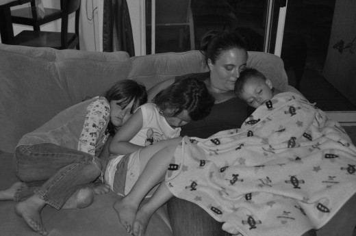 There is nothing better than cuddling with your children, even if it means having to put the laptop away.