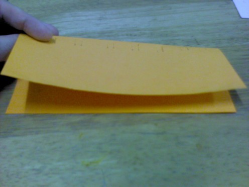Fold yellow paper into half 