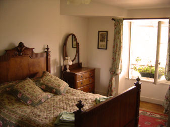 Guest house:  Our four bedrooms are furnished with antique French furniture