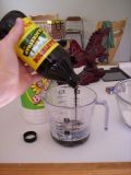 Blackstrap molasses is thick and has dark color.   http://www.flickr.com/photos/spyderella/2425954/