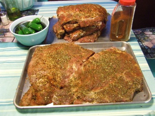 I use a Mortar and Pestle and pulverize Rosemary, Sage, Oregano, Onion Powder, Cajun Powder, Dry Mustard Powder, and a little Ground Pepper for my dry rub. I left the hot pepper up to those who wanted some on their ribs. I DO NOT salt the ribs.