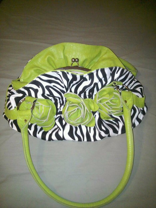 This Lime Zebra Purse gives a punch of color to a simple white tunic over black leggings!  