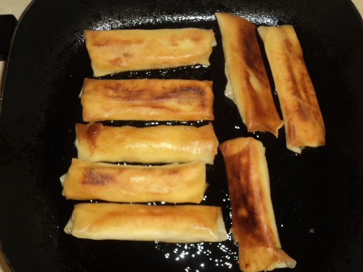Flipped over lumpia cooking