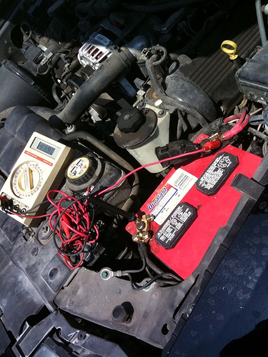 Checking for loose car battery cables