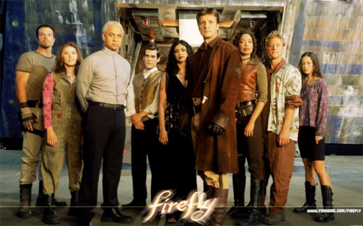 This picture is actually from the TV show Firefly. From left to right: Jayne, Kaylee, Shepherd Book, Simon, Inara, Mal, Zoe, Wash, River