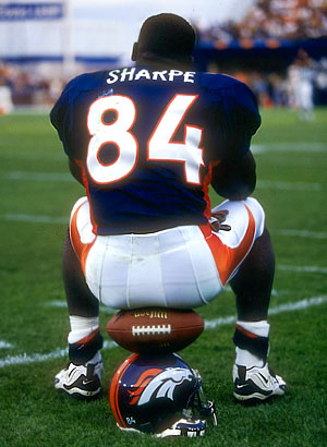 Shannon Sharpe  played Tight End     * Denver Broncos (1990-1999)     * Baltimore Ravens (2000-2001)     * Denver Broncos (2002-2003) 
