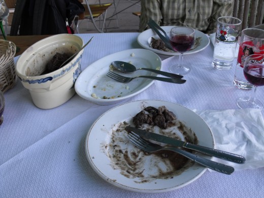 This is what a European table looks like. The cutlery across the plate means the meal is now finished and the waiter can remove everything.