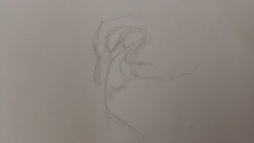 Start to define the arms, head and torso slightly.