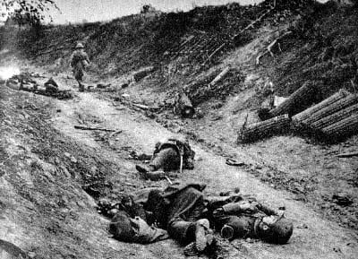 Dead soldiers laying on a road