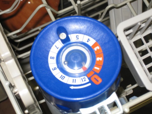 See that little metal ball? That tells you how many washes you have left - I currently have 9 left.  That little "window" at the top of the picture allows you to see the detergent for the next wash.