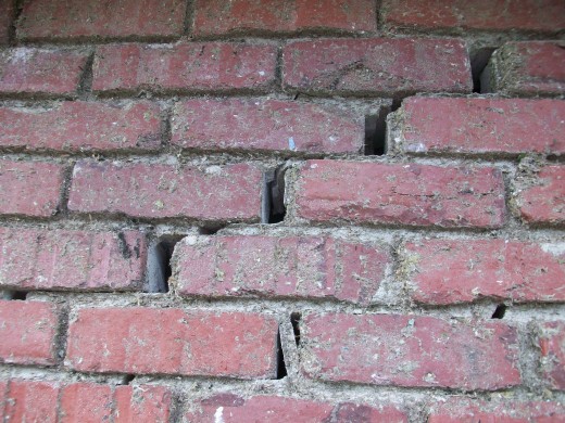Bricks pulled out of place.