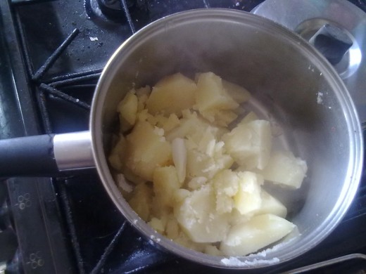 Cook the potato and onion until soft