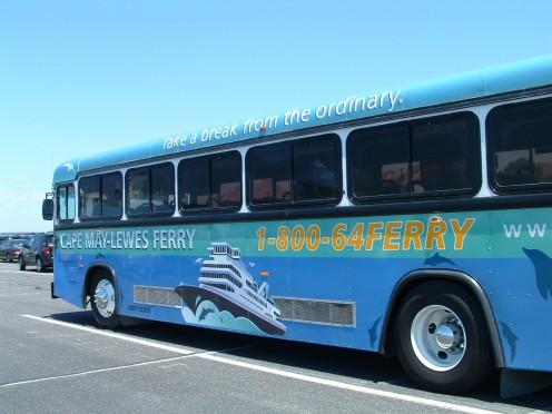 Air conditioned tour bus parked at the Lewes ferry terminal ready to take passengers to the Tanger Outlets for tax free shopping. 